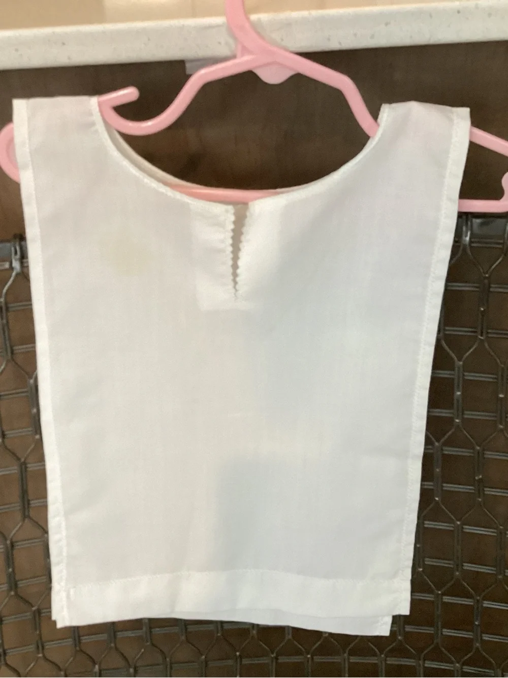 Vtg. Hand-made? Baptismal Bib (garment). The pink embroidery features the